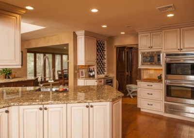 Abbey's custom design kitchen with whitewashed wood cabinets