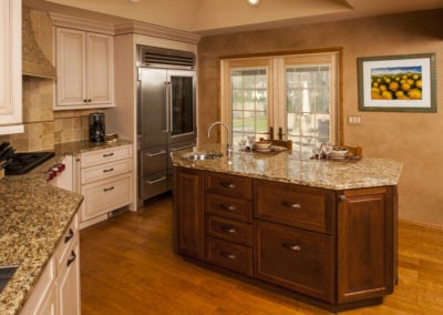 Abbey's custom design kitchen with whitewashed and dark wood cabinets