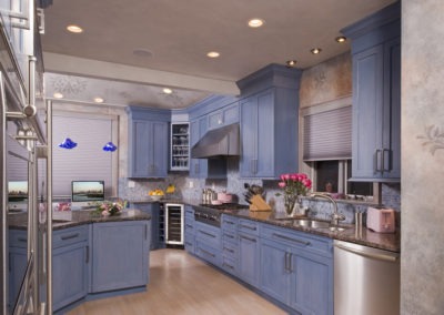 Abbey's custom design kitchen with trendy blue cabinets and stainless accents
