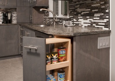 Abbey's modern custom design kitchen with unique corner base pantry