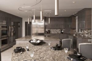 Abbey's custom design modern kitchen, gray cabinets with stainless accents