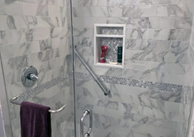 Abbey's bathroom renovation, quick elegant, carrara marble tile shower