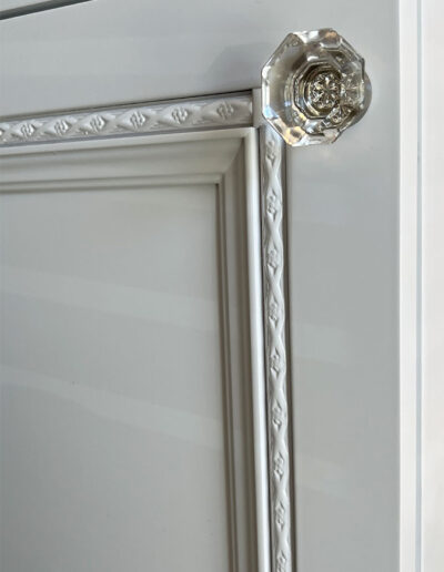 Cabinet wood door detail, roping, classic glass knob