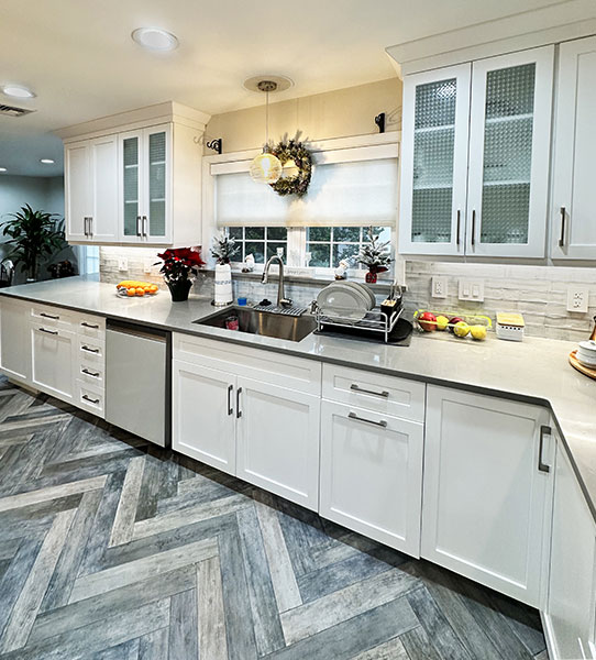 Before and after images of a kitchen remodel by Abbeys Kitchens and Bathroom remodels ner Bayonne, NJ